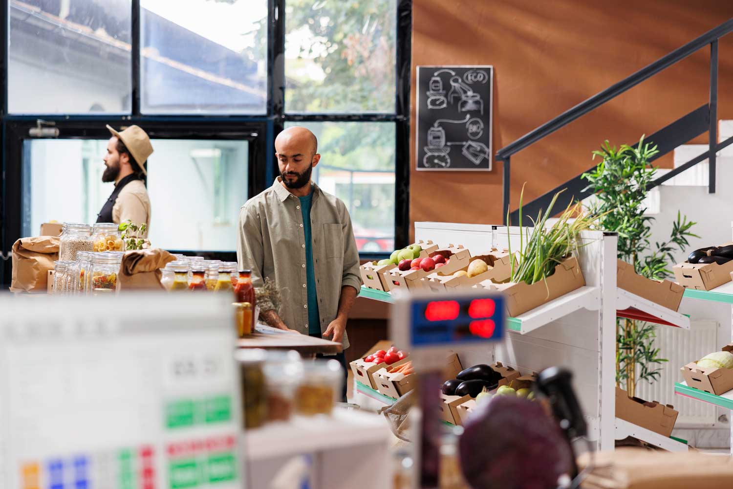 Two men shopping in grocery store