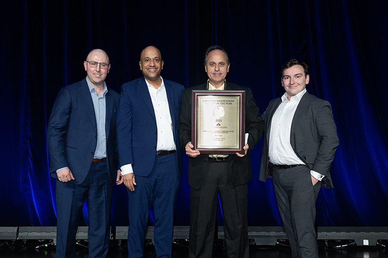Team Maple, Yummy Market accepting the David C. Parsons Gold Award, 2024